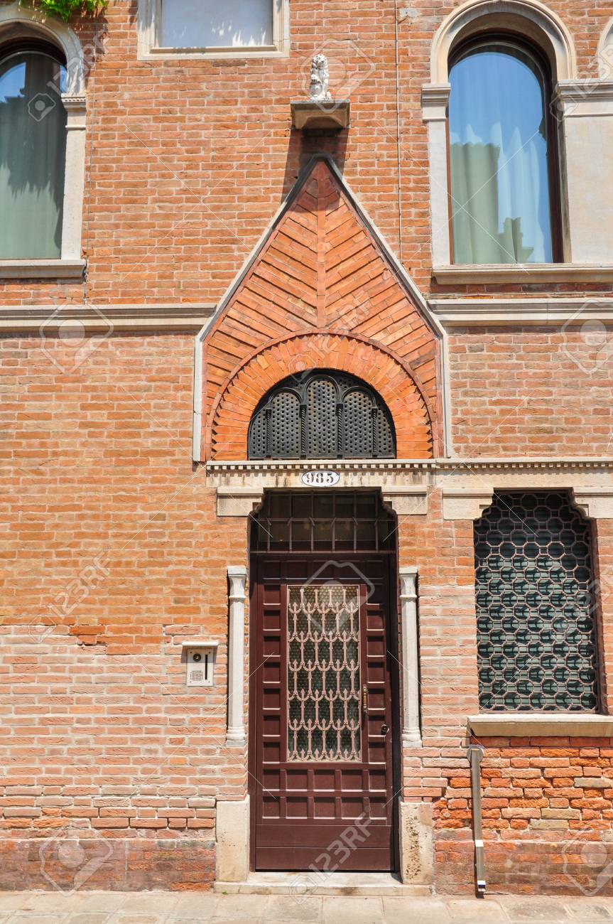 Doorway With Brick Decorative Arch In Calle Larga Nani Venice Stock