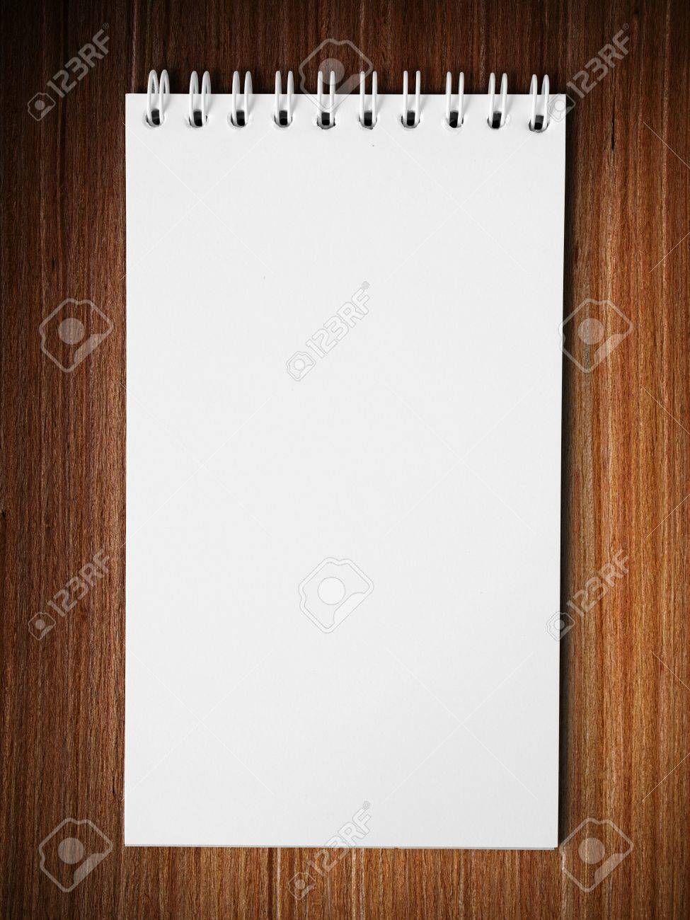 Long Blank White Note Book Vertical On Wood Table Background Stock Photo Picture And Royalty Free Image Image