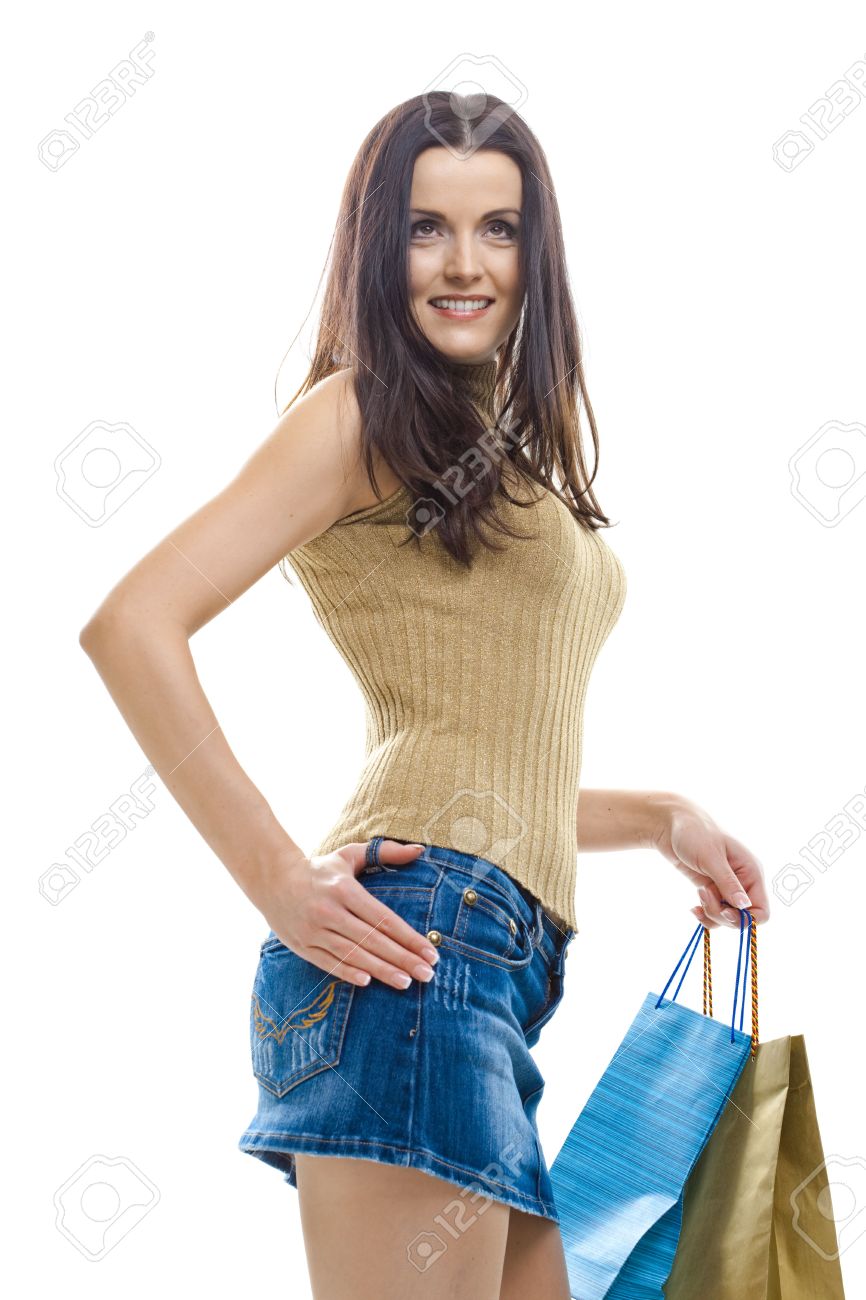 Sexy Young Woman Wearing Mini Skirt Posing With Shopping Bags Isolated On Whte Stock Sexy Young Woman Wearing Mini Skirt Posing With Shopping Bags Isolated On Whte Stock