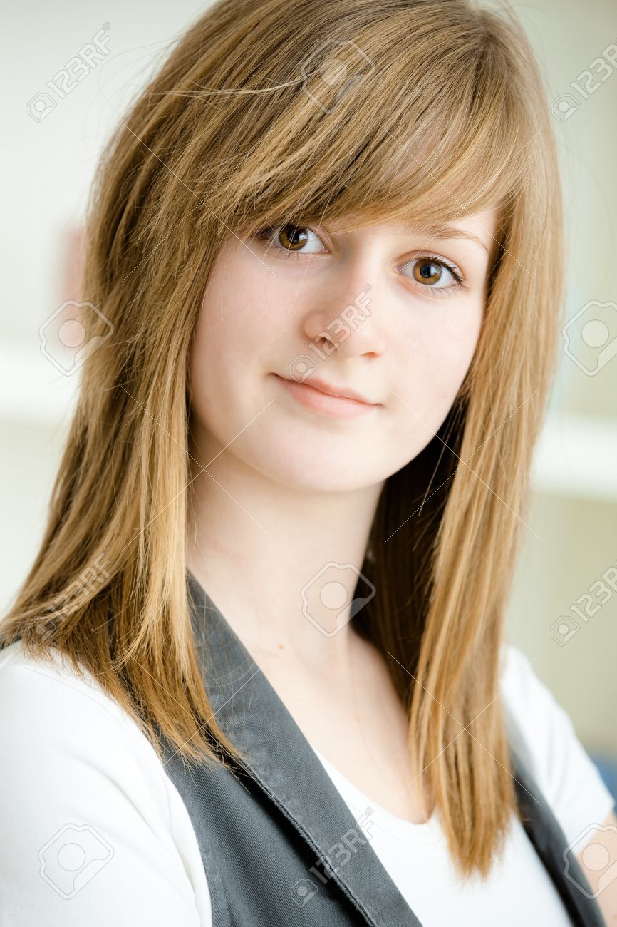 Closeup Portrait Of Teenage Girl With Long Blond Hair And Big