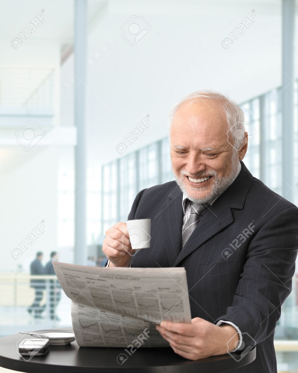 8746930-Senior-businessman-on-coffee-bre
