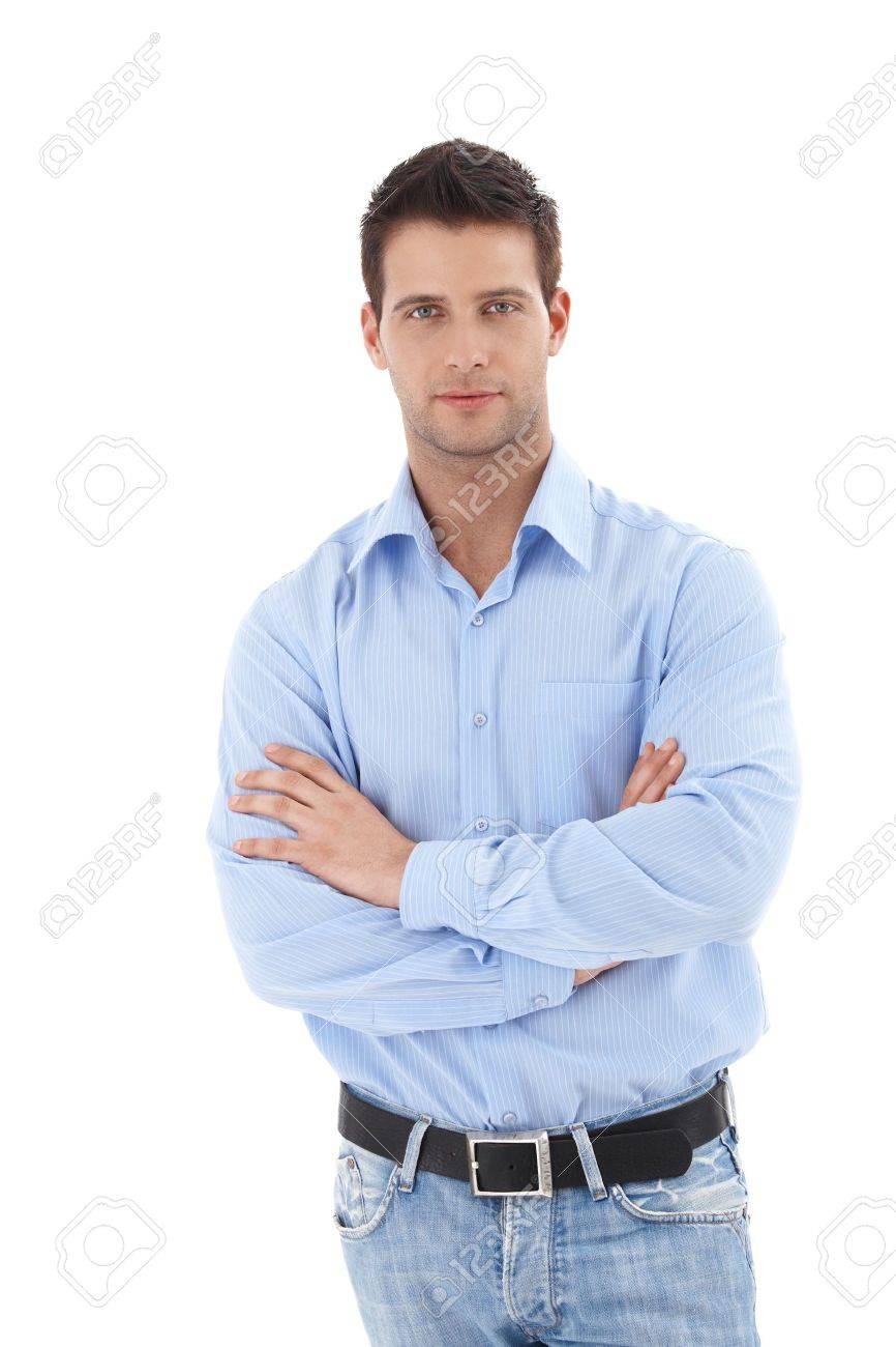 Studio portrait of handsome casual man standing with arms folded, looking at camera, isolated on white. - 9562506 Studio portrait of handsome casual man standing with arms folded, looking at camera, isolated on white. - 9562506