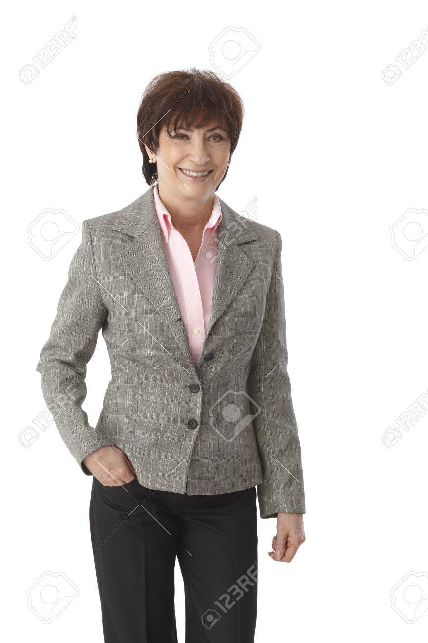 ポケットに手を浮かべてするズボンとジャケット 立っている上級実業家 の写真素材 画像素材 Image