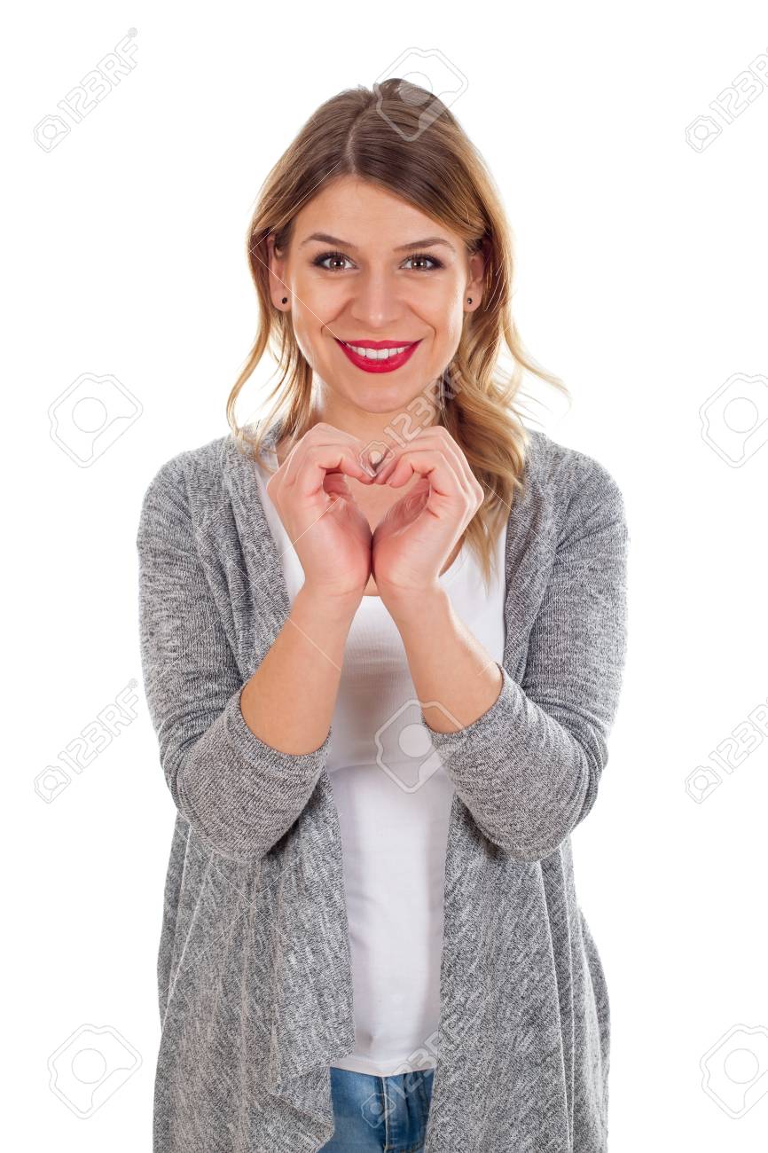 両手でハートマークを見せて美しい若い女性の画像 の写真素材 画像素材 Image