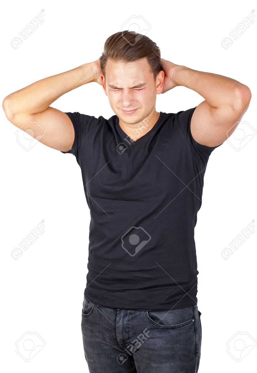 Picture Of A Worried Young Man Standing On An Isolated Background Stock  Photo, Picture and Royalty Free Image. Image 91980505.