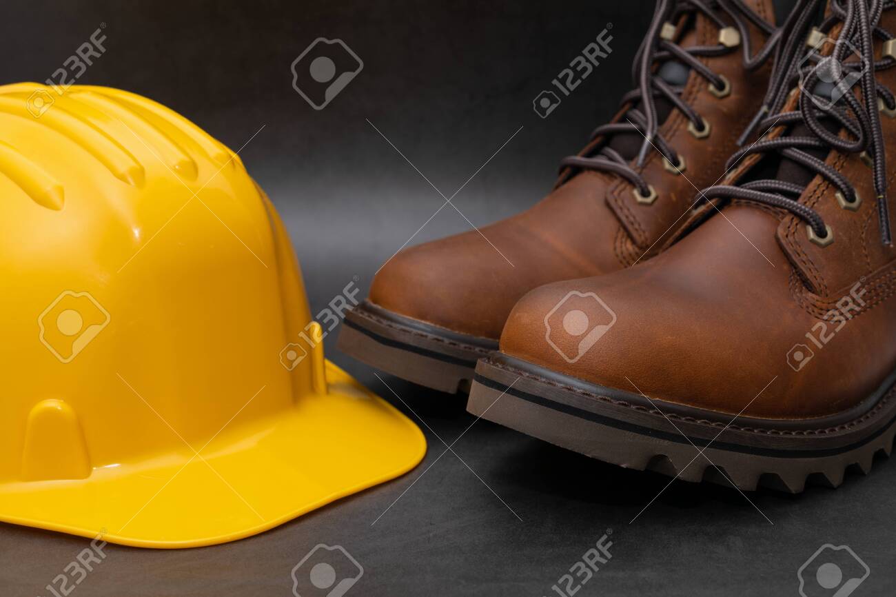 Download Safety Gloves Boots Yellow Hard Hat On A Black Background Stock Photo Picture And Royalty Free Image Image 140260943 Yellowimages Mockups
