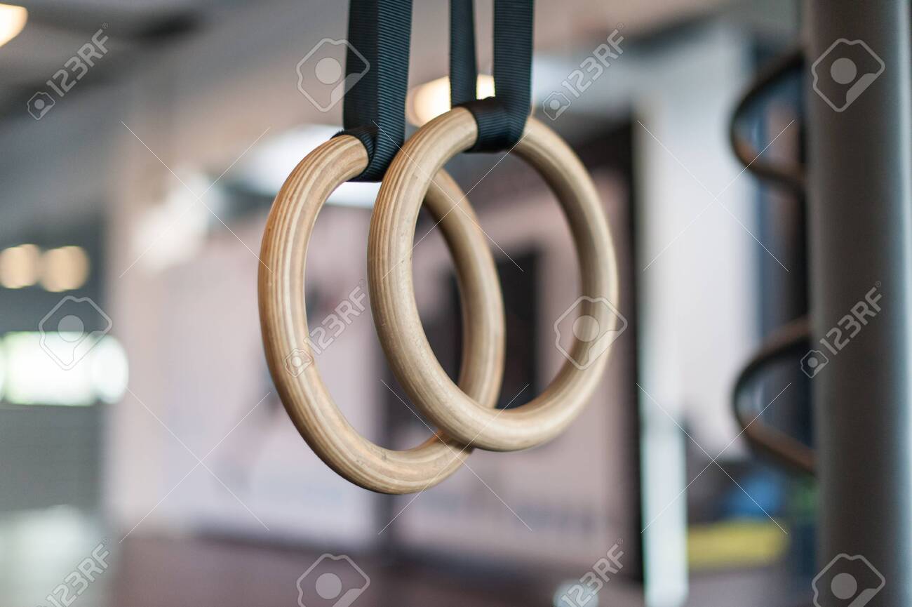 Wooden turn rings in fitness hall - 122275524 Wooden turn rings in fitness hall - 122275524