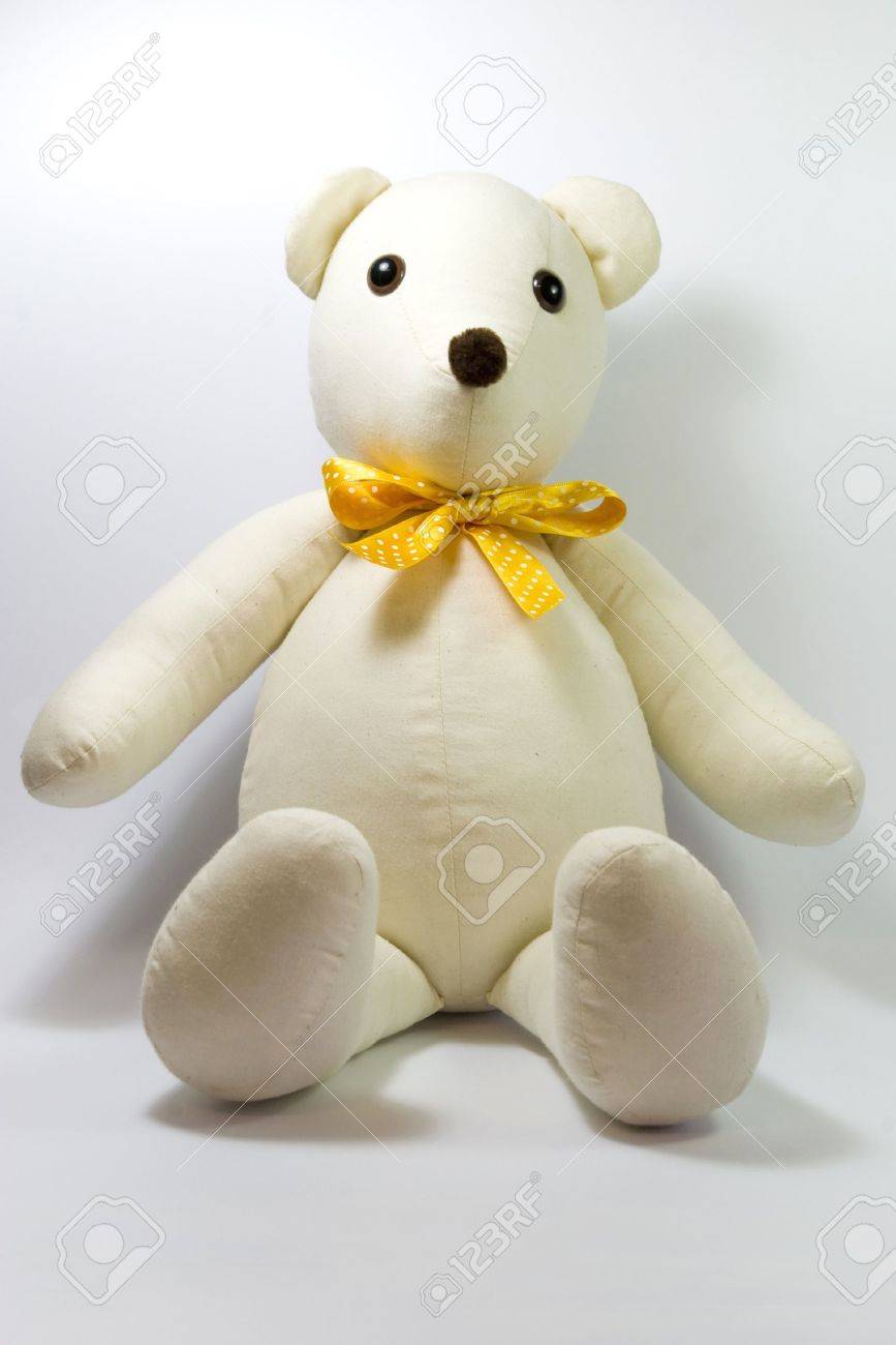 yellow and white teddy bear