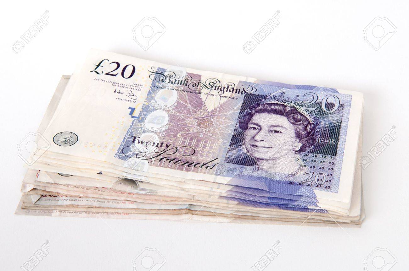 a stack of 20 great british pounds bank notes royalty free