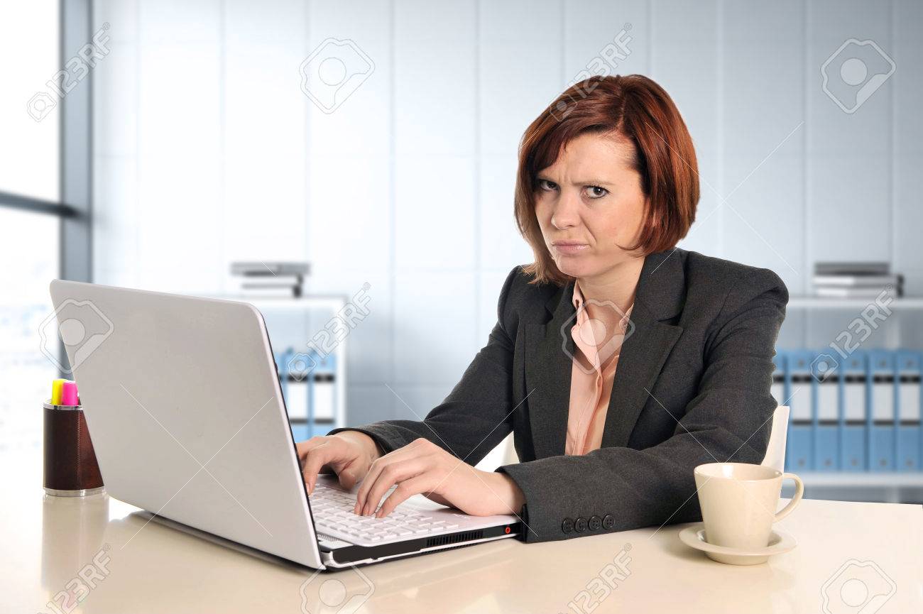 Young Busy Beautiful Business Woman Suffering Stress Working At Office Computer Desk Worried And Desperate Young Busy Beautiful Business Woman Suffering Stress Working At Office Computer Desk Worried And Desperate