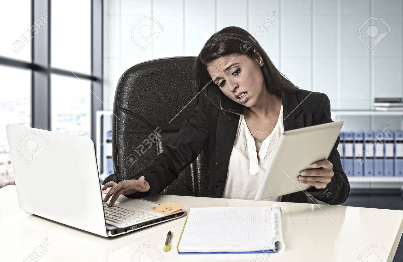 Young Busy Beautiful Latin Business Woman Suffering Stress Working At Office Computer Desk Worried And Desperate Young Busy Beautiful Latin Business Woman Suffering Stress Working At Office Computer Desk Worried And Desperate