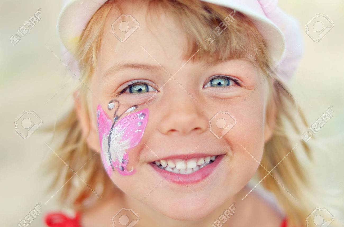 Portrait Of Little Girl With Butterfly Face Painting Stock Photo Picture And Royalty Free Image Image 33287386