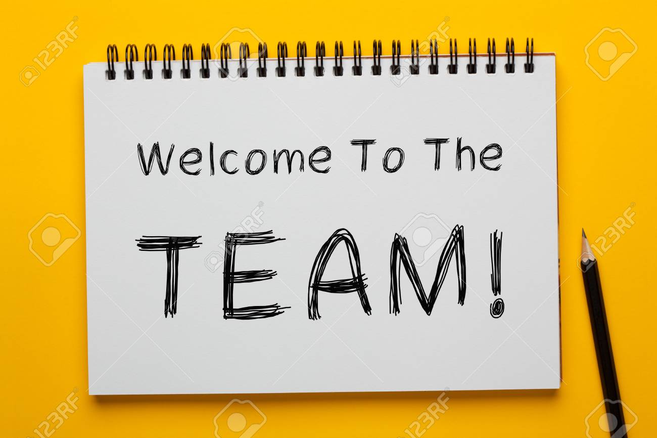 Welcome To The TEAM! written on notepad with pencil on yellow background. Business concept. - 109563014 Welcome To The TEAM! written on notepad with pencil on yellow background. Business concept. - 109563014