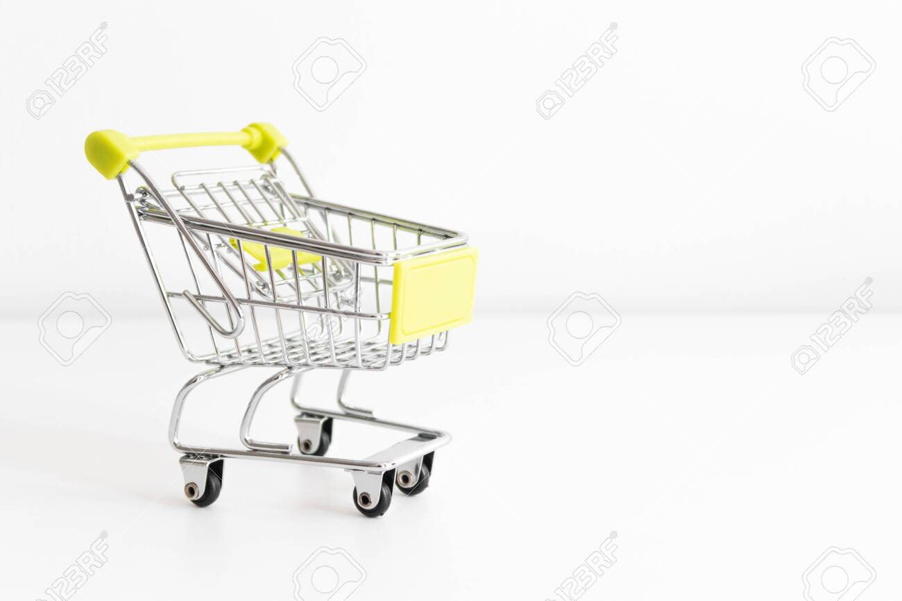 Download Shopping Cart On White Background Small Miniature Shop Trolley Stock Photo Picture And Royalty Free Image Image 145553972