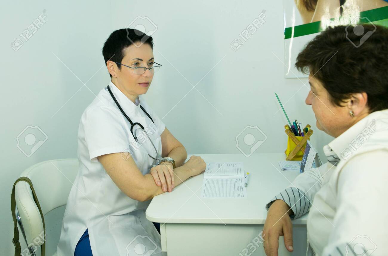 A visit to a beautician. The doctor tells the patient about the need for facial skin care. - 152706739 A visit to a beautician. The doctor tells the patient about the need for facial skin care. - 152706739