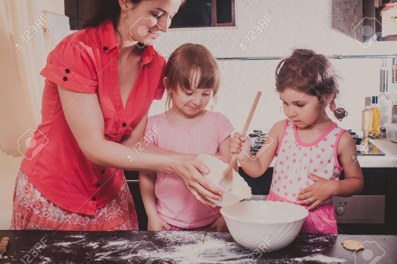 Mom Is Baking Cookies With Her Kids At Home Kitchen Stock Photo ...