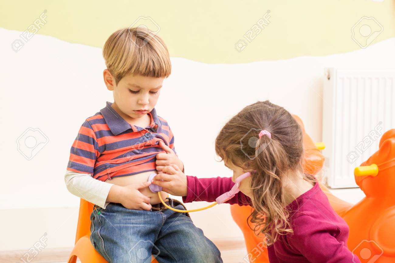 children playing doctor and patient children play doctor