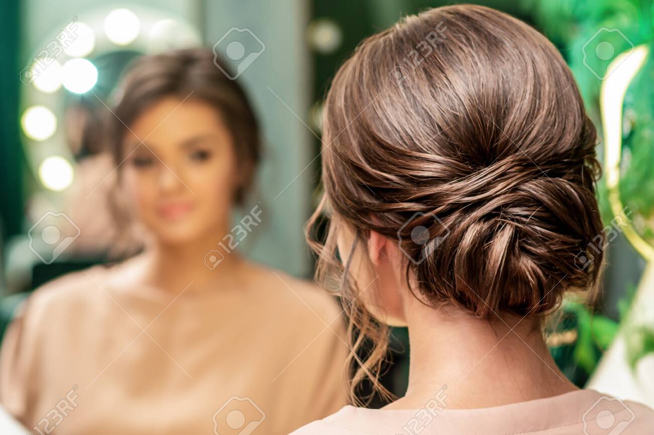 Beautiful Brunette Young Woman With Hairstyle In Front Of The Mirror At Beauty Salon, Back View. Stock Photo, Picture And Royalty Free Image. Image 141192505. Beautiful Brunette Young Woman With Hairstyle In Front Of The Mirror At Beauty Salon, Back View. Stock Photo, Picture And Royalty Free Image. Image 141192505.