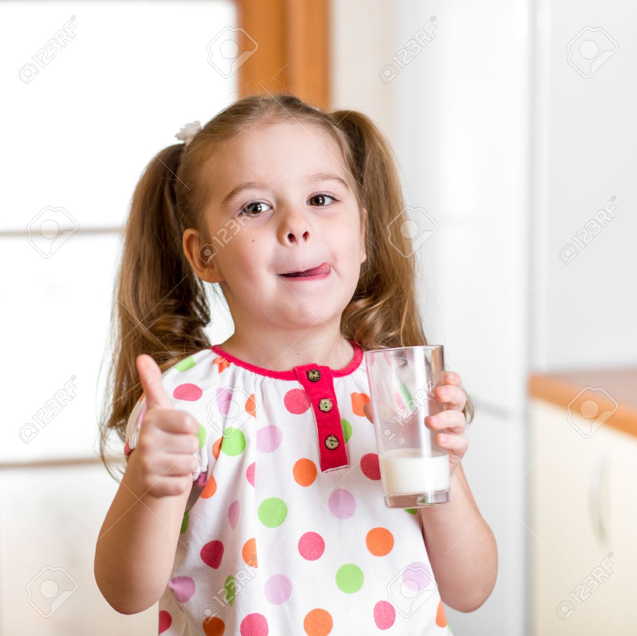 child drinking milk