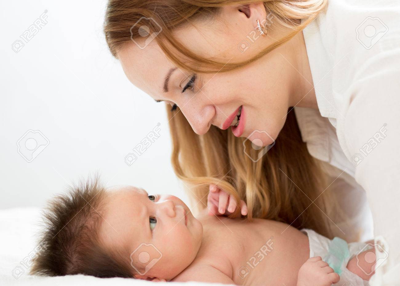 baby looking at mom