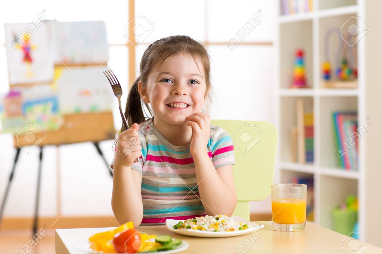 littlegirl eat Child Little Girl With Fork Ready To Eat Stock Photo, Picture and Royalty  Free Image. Image 68390627.