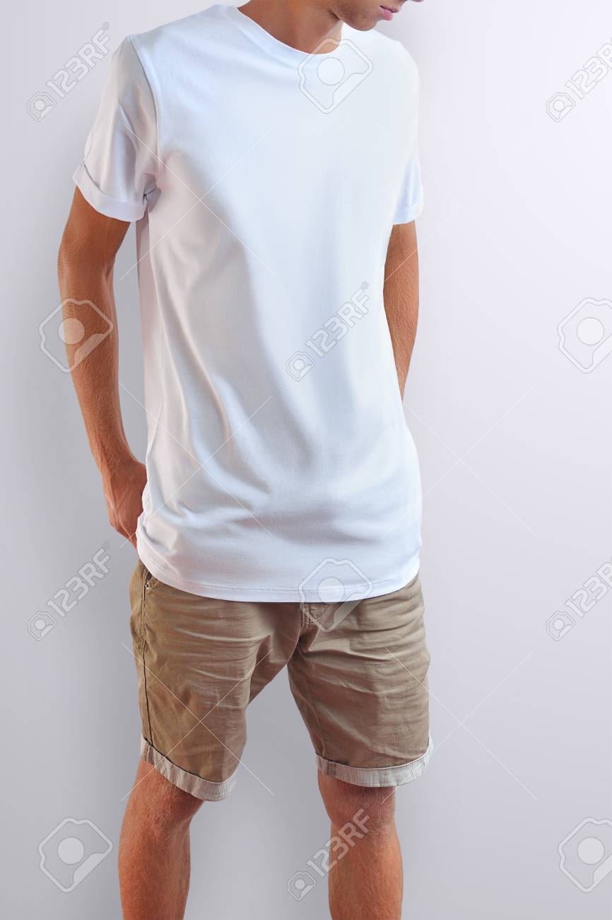 Download Attractive Slim Guy In A Blank T Shirt And Cotton Brown Shorts Stock Photo Picture And Royalty Free Image Image 115859095