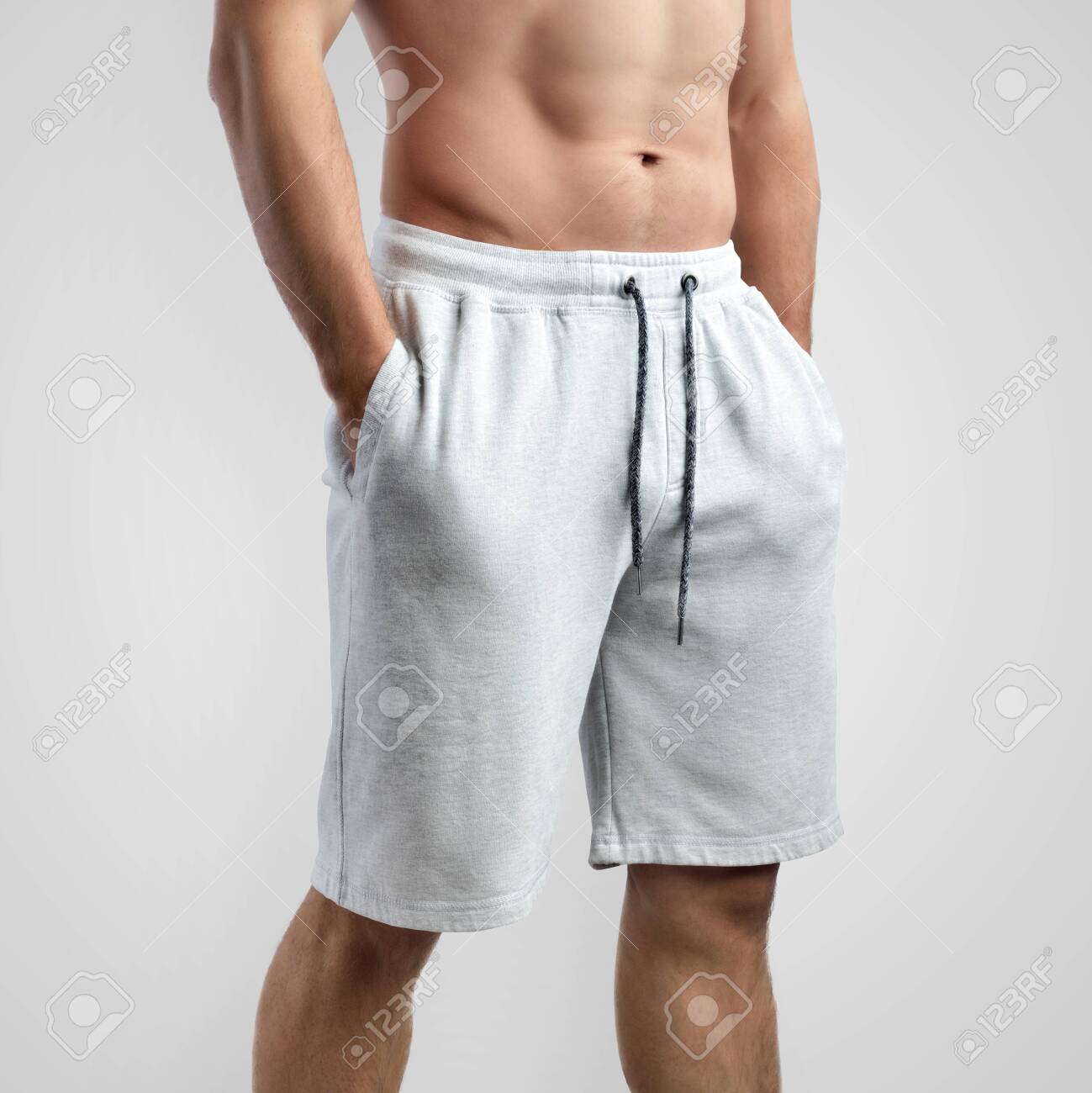 Download Mockup Of White Men S Shorts On An Isolated Background Side Stock Photo Picture And Royalty Free Image Image 138280120