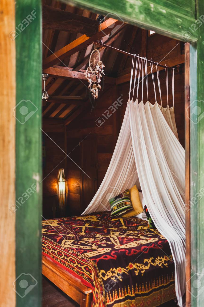 traditional bed frame metal hippie style wooden room with traditional bed covered by colorful blanket ornament hanging baldachin style wooden room with traditional bed covered by colorful traditional bed frame metal hippie style wooden room with traditional bed covered by colorful blanket ornament hanging baldachin style wooden room with traditional bed covered by colorful