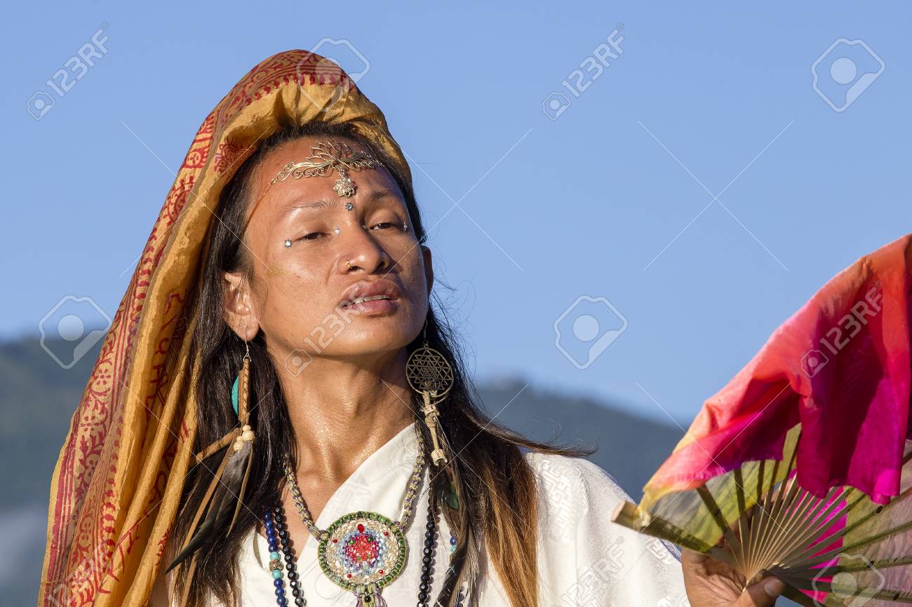 Shemale Dancing With Fan At Sunrise Pokhara, Nepal Stock Photo, Picture Royalty Free Image. 93859440.