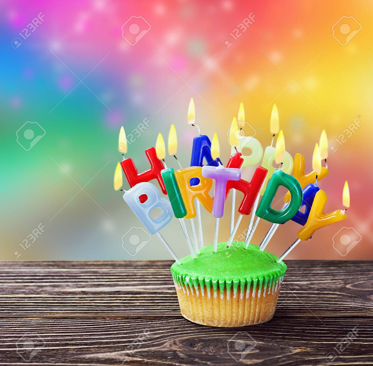 Colorful Happy Birthday Cupcakes With Candles Stock Photo Picture