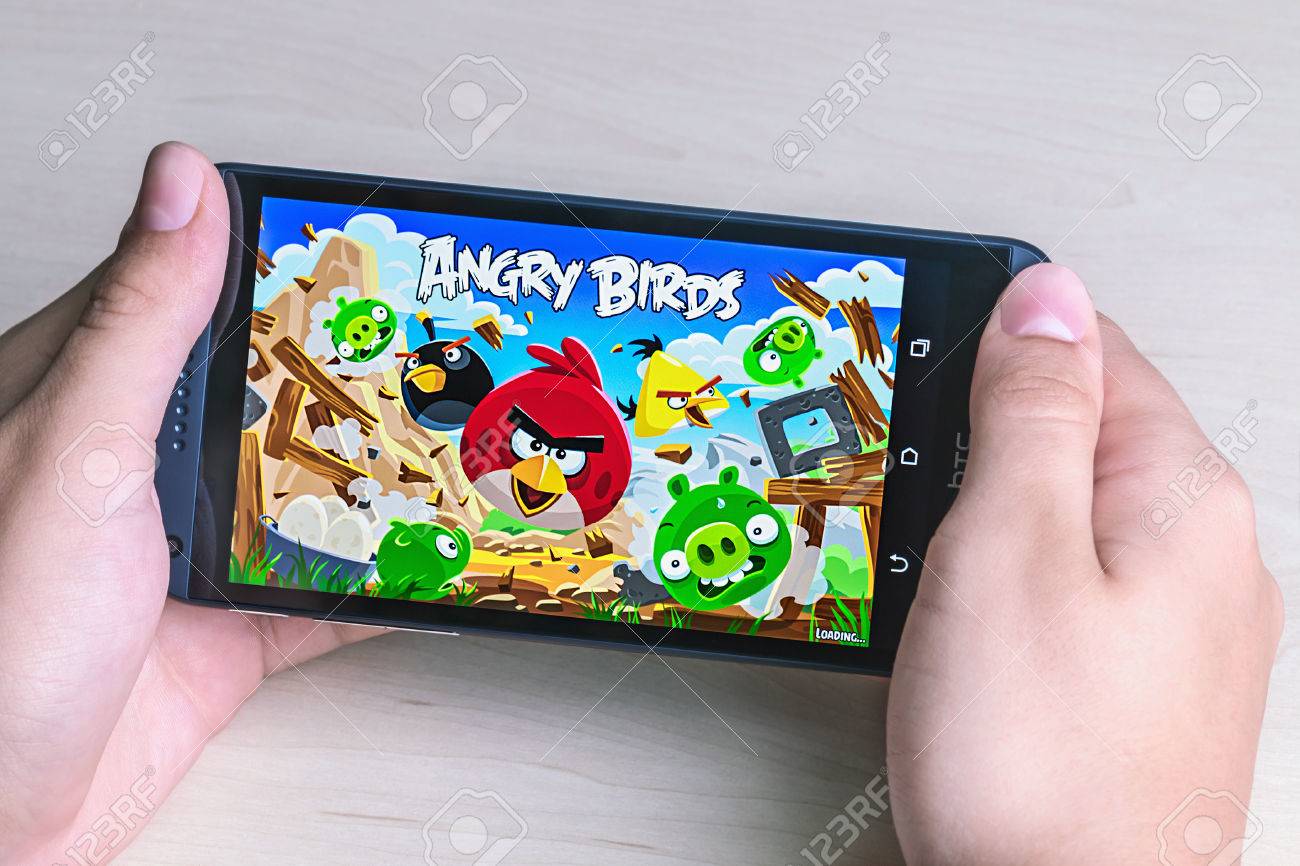 Moscow, Russia - August 26, 2014: Angry Birds computer game developed by Finnish company Rovio Entertainment first released in 2009. It sold over 2 billion copies across all platforms - 31187666 Moscow, Russia - August 26, 2014: Angry Birds computer game developed by Finnish company Rovio Entertainment first released in 2009. It sold over 2 billion copies across all platforms - 31187666
