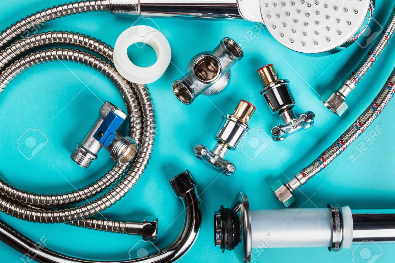 Different Plumbing Fixtures For Use In The Bathroom And Toilet Stock Photo