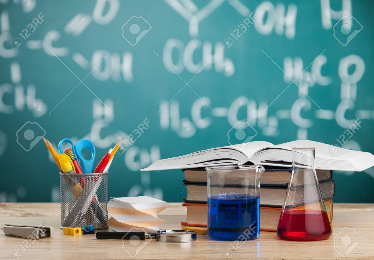 Classroom desk and drawn blackboard of chemistry - 106339861 Classroom desk and drawn blackboard of chemistry - 106339861