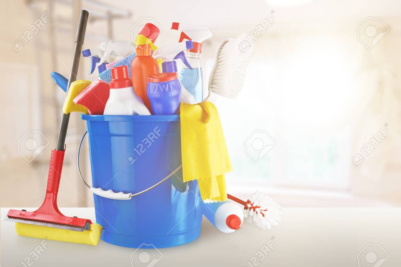Plastic bottles, cleaning gloves and bucket on white background - 124465349 Plastic bottles, cleaning gloves and bucket on white background - 124465349