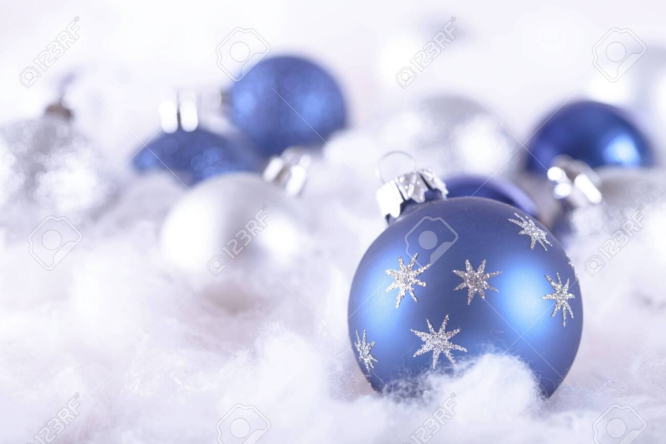 Blue And White Christmas Baubles On The Wadding On The Grey Background Stock Photo Picture And Royalty Free Image Image 125049967