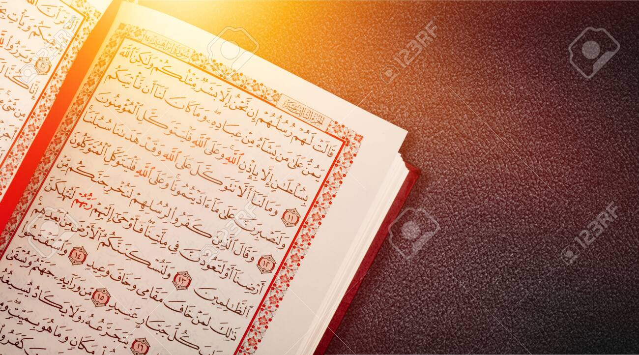 An Open Page Of Quran Shows Surah Al Kahf On Black Background Quran Is An Islamic Holy Book For Muslim Selective Focus Stock Photo Picture And Royalty Free Image Image 151541542