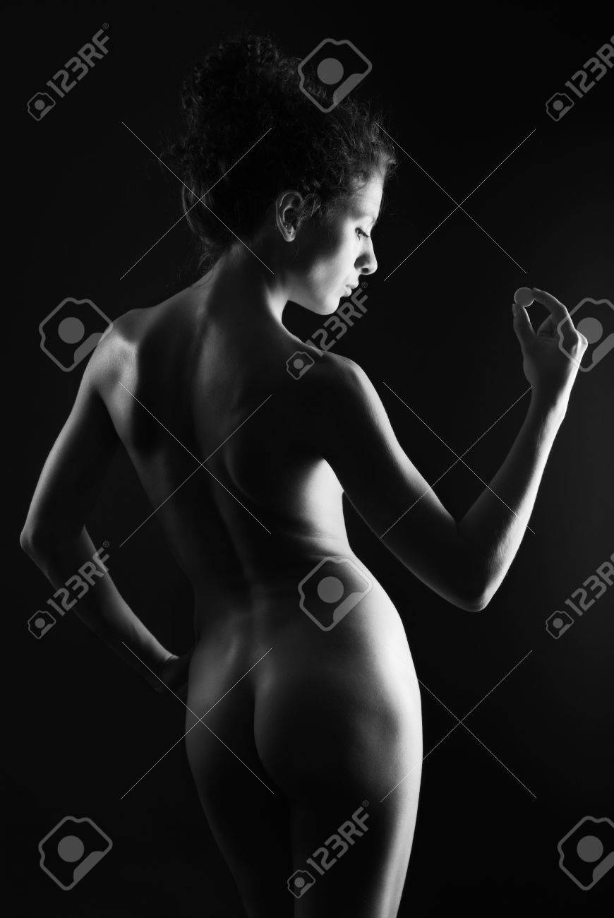 Naked Women Looking Behind Her