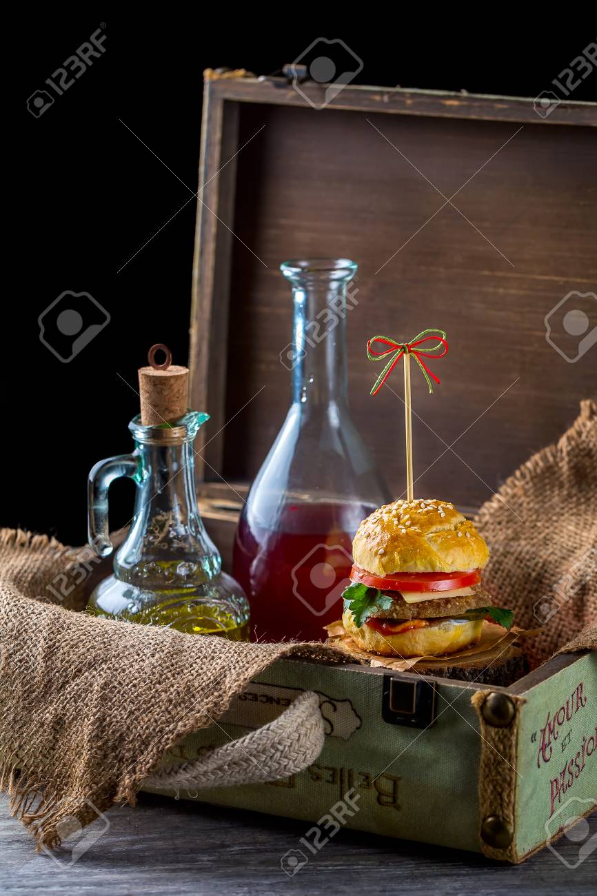 Burger And Bottles Of Oil And Sauce Decorative Suitcase On The