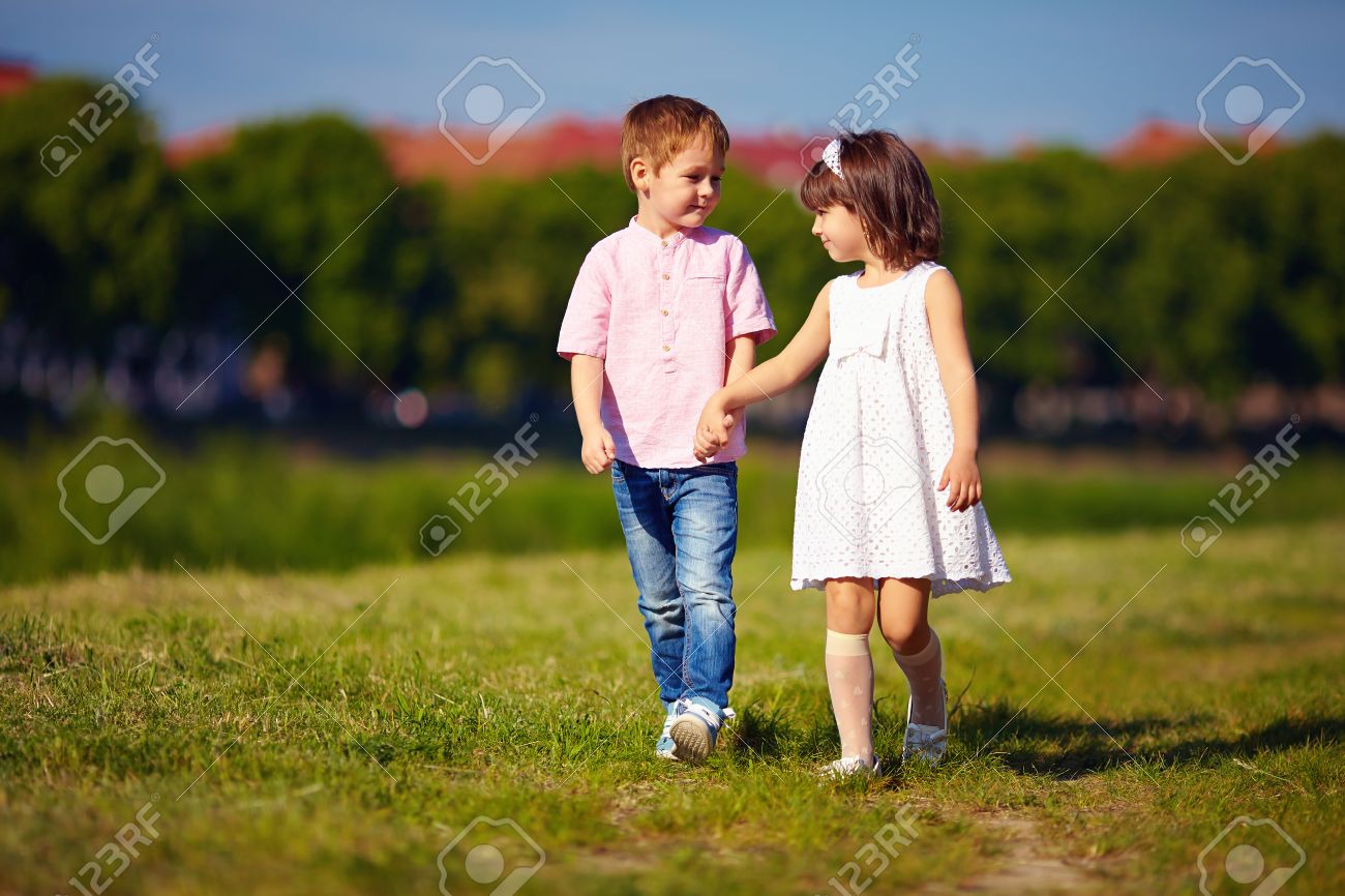 cute kids couple walking