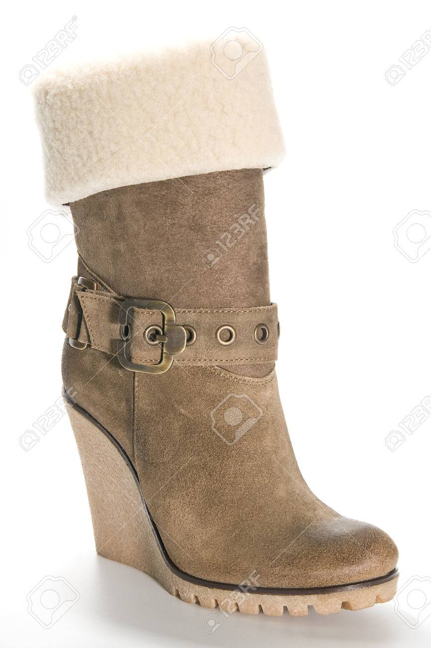 Botas De Ante De Color Beige De La Mujer En Un Alto única Botas De Ante De Color Beige De La Mujer En Un Alto única