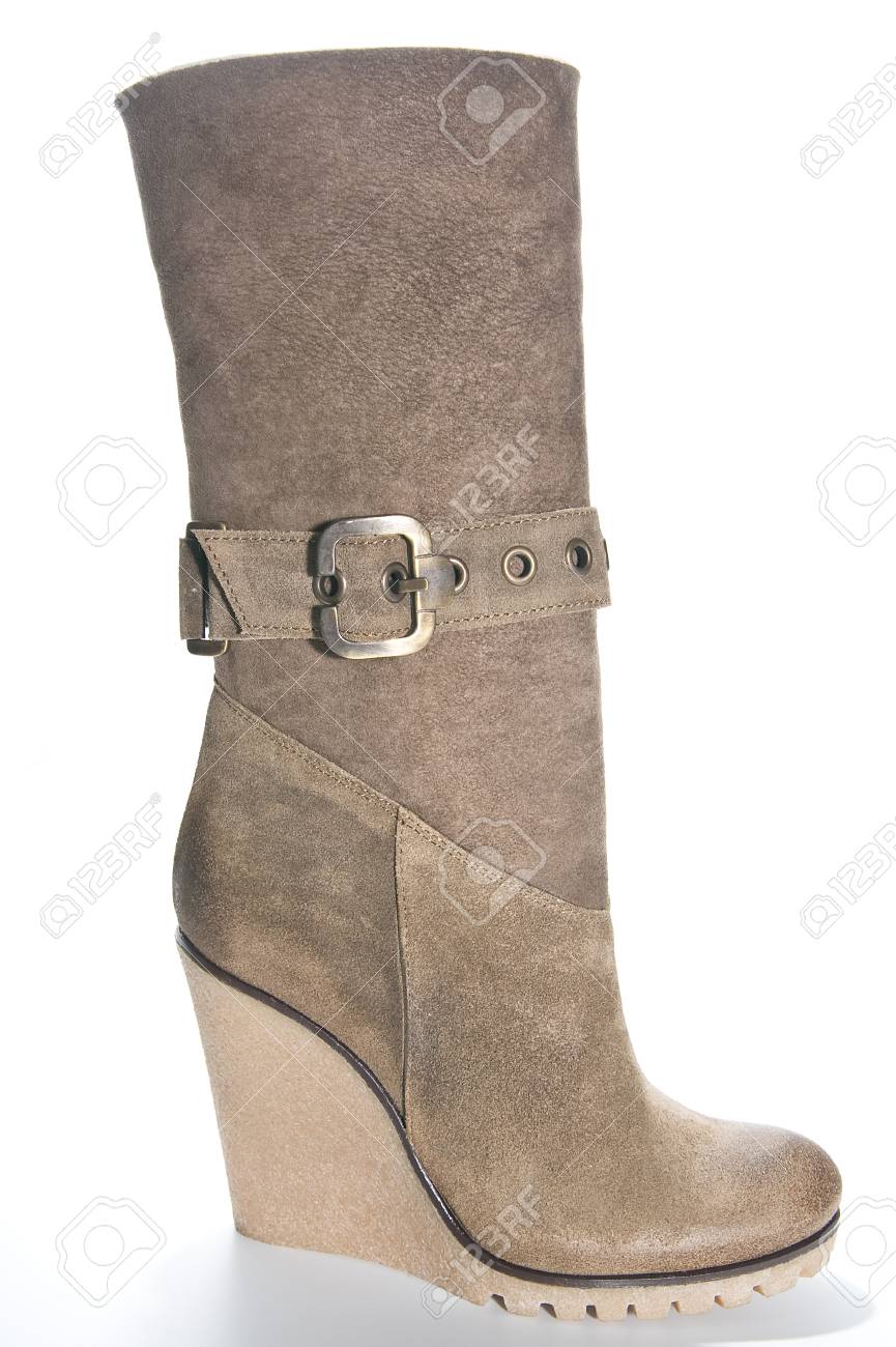 Botas De Ante De Color Beige De La Mujer En Un Alto única Botas De Ante De Color Beige De La Mujer En Un Alto única