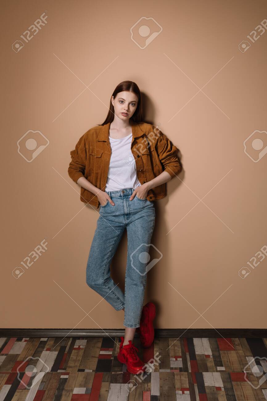 beige jacket with jeans