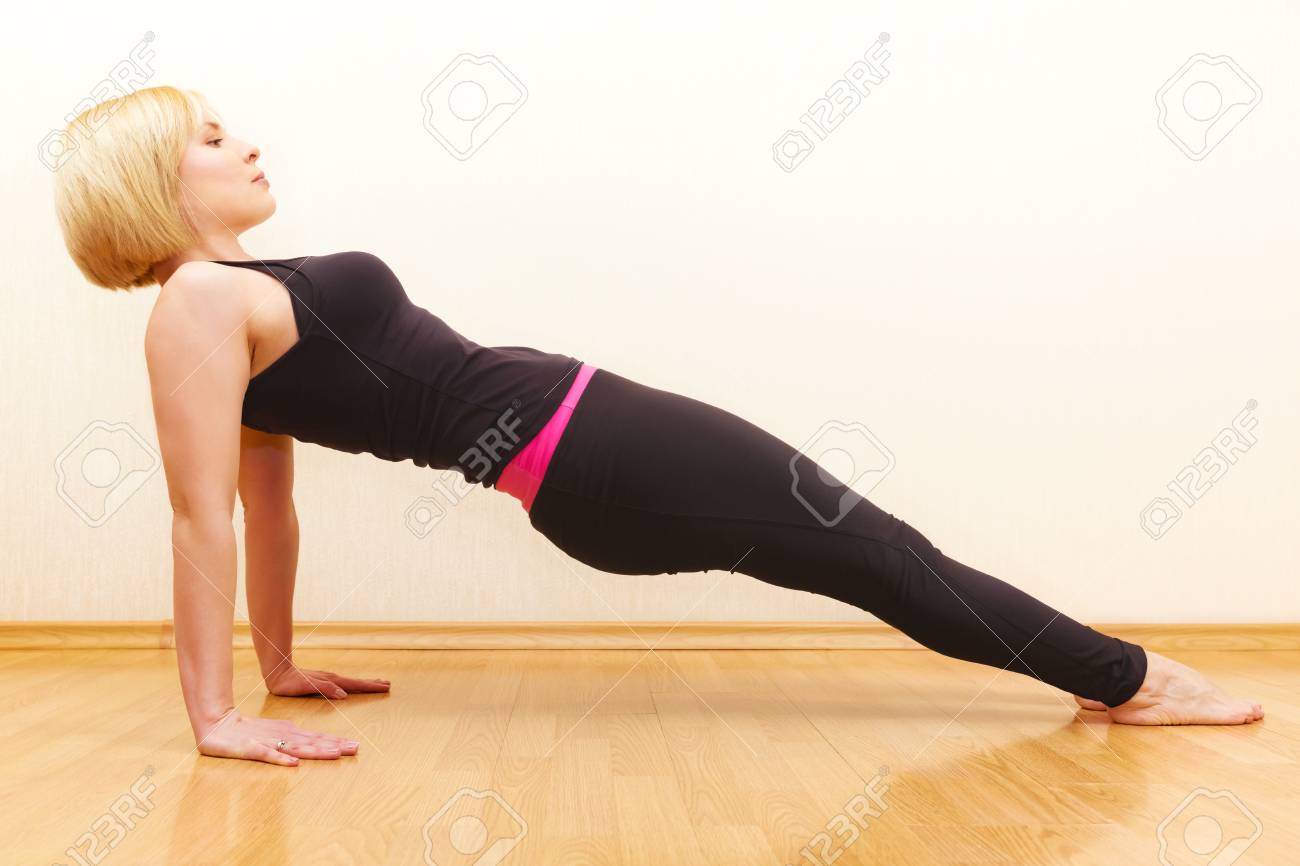 Blonde Woman With Short Hair Practicing Yoga Asana Purvottanasana