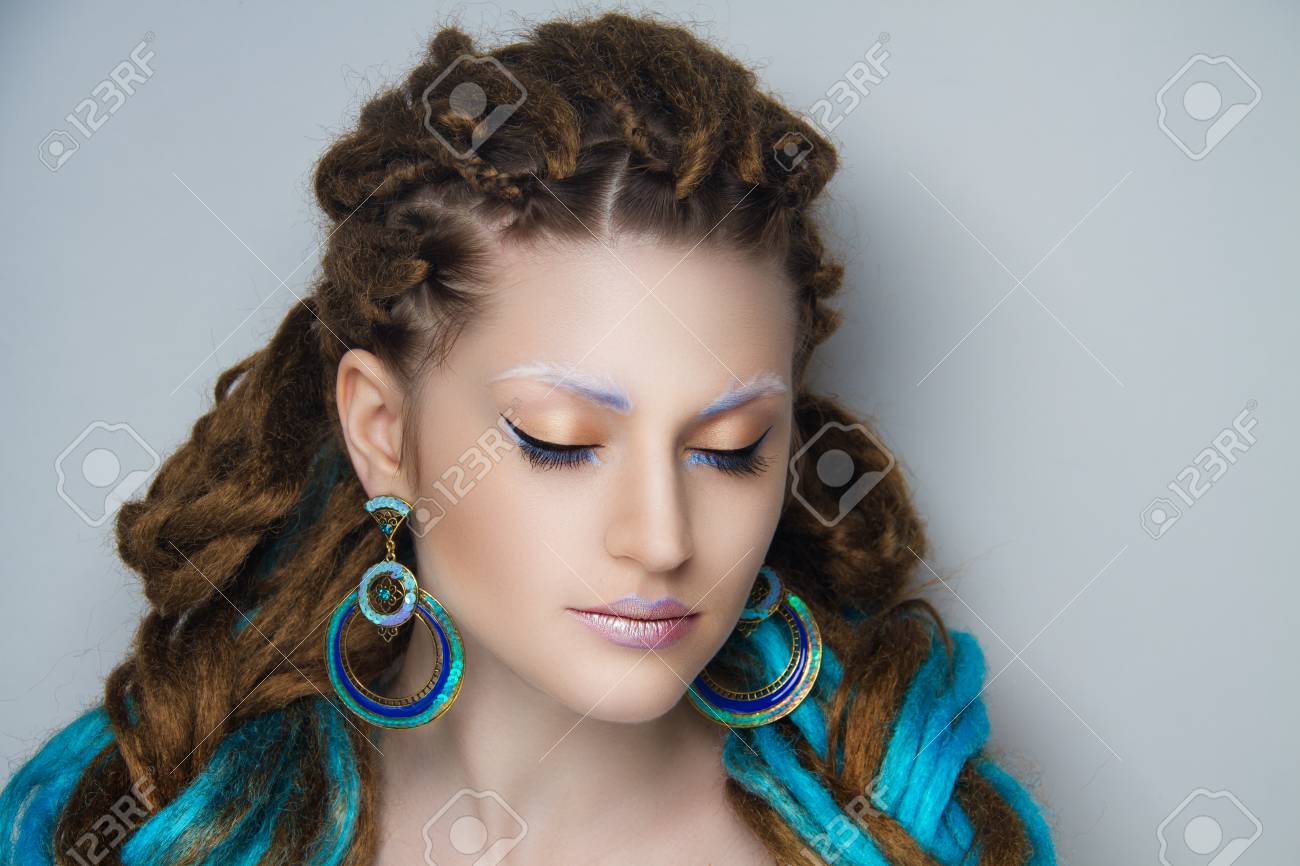 Young Beautiful Girl With Brown And Blue Dreadlocks Stylish