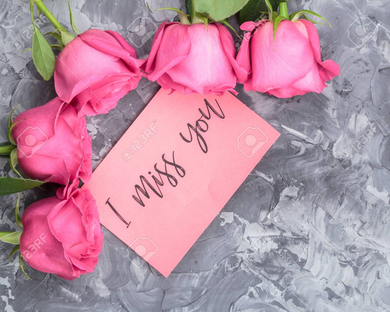 Romantic Concept Red Roses And Lettering I Miss You On A Gray