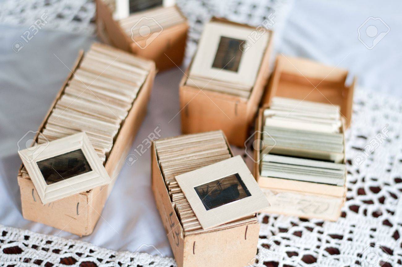 old slides into a cardboard box stock photo picture and royalty