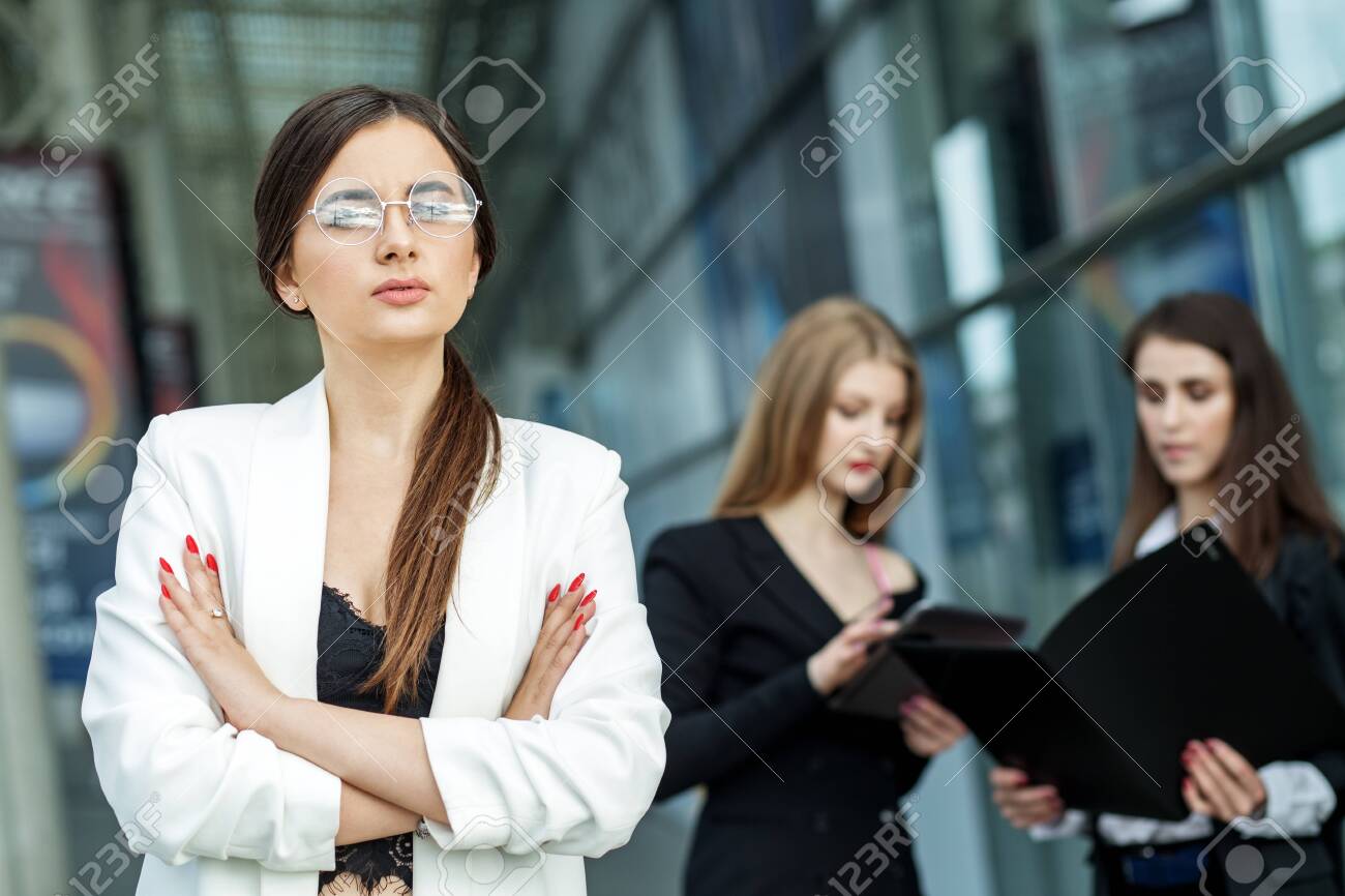 The woman head of the company is wearing glasses. Concept for business, marketing, finance, work, planning and lifestyle. - 126020651 The woman head of the company is wearing glasses. Concept for business, marketing, finance, work, planning and lifestyle. - 126020651