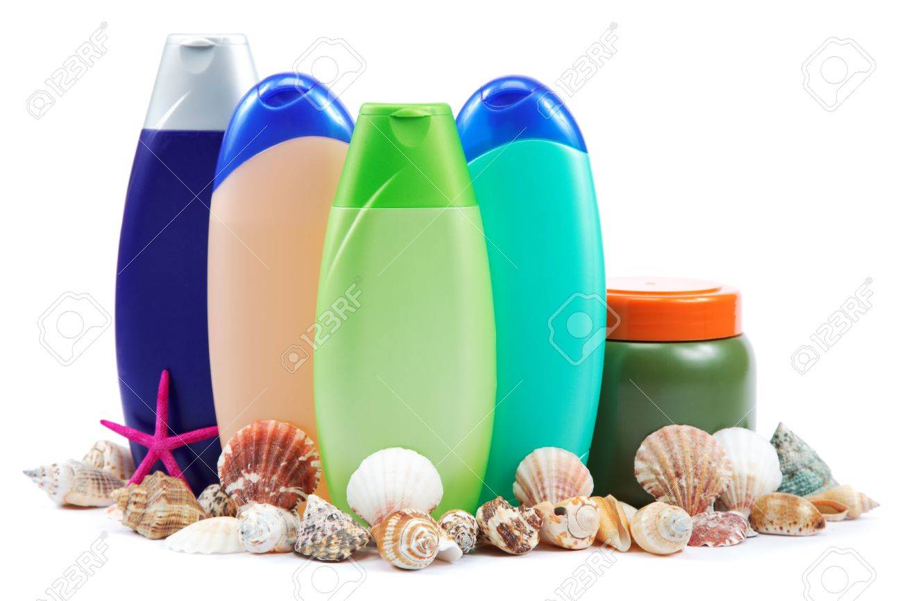 Different color tubes and bottles for hygiene, health and beauty on a white background. - 18975636 Different color tubes and bottles for hygiene, health and beauty on a white background. - 18975636