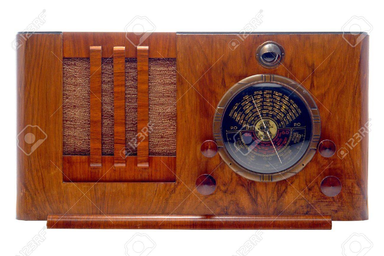 Antique 1930's Art Deco Style Tube Radio With Wood Cabinet And Antique 1930's Art Deco style tube radio with wood cabinet and magic eye isolated on white - Antique 1930's Art Deco Style Tube Radio With Wood Cabinet And