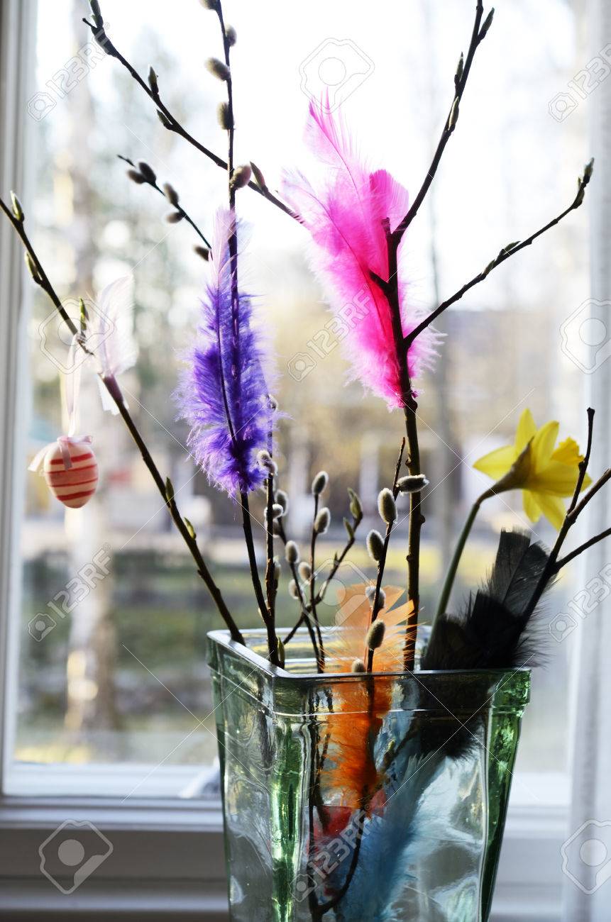 Easter Still Life Willow Branch And Feathers In A Vase On The